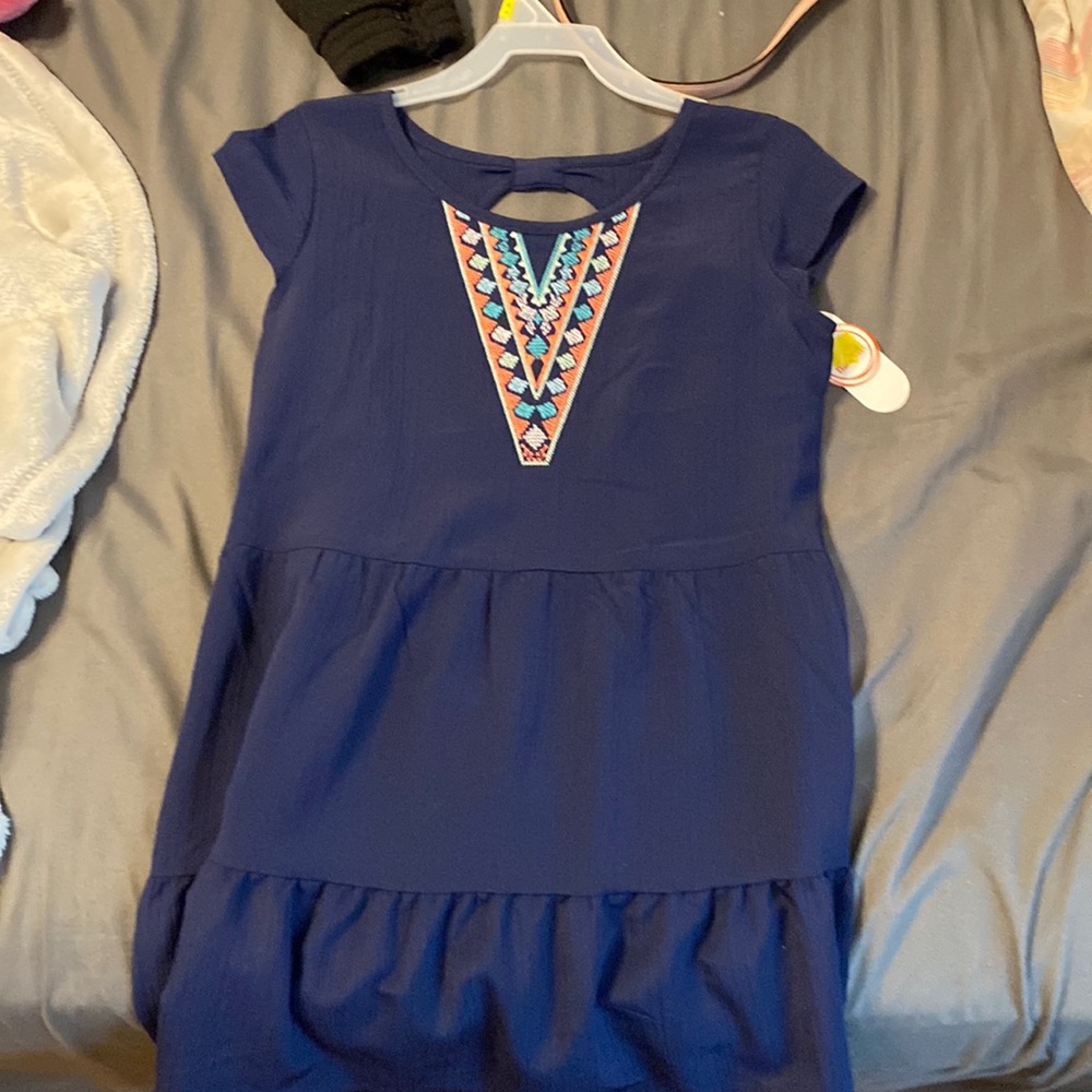 Beautiful Blue and Multi colored dress with little back showing.